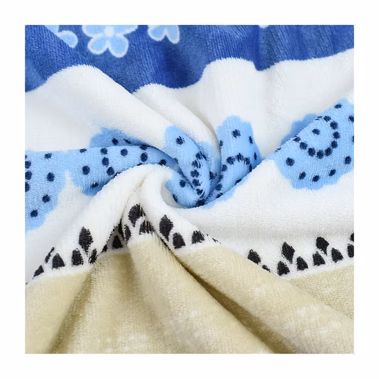 Coperta lavorata a trecce con pois per bebè